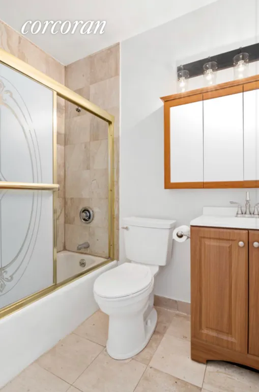 New York City Real Estate | View 393 West 49th Street, 4S | Master Bathroom | View 4