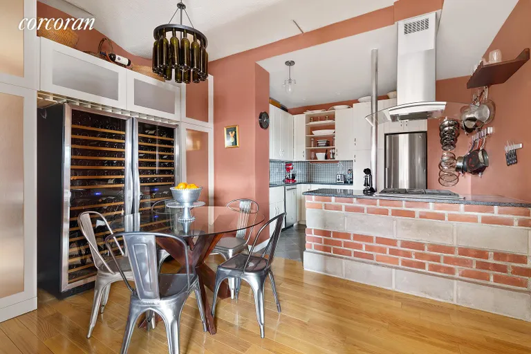 New York City Real Estate | View 720 Greenwich Street, 7A | Lovely kitchen opens to dining area | View 3