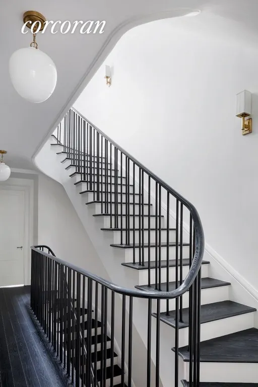 New York City Real Estate | View 145 West 11th Street, TH133 | Stairs with Skylight Above | View 3