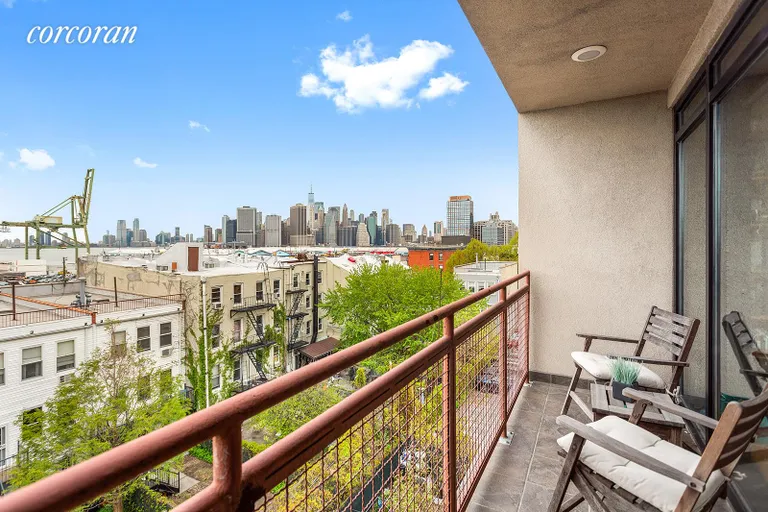 New York City Real Estate | View 20 Tiffany Place | Balcony with harbor and city view | View 2