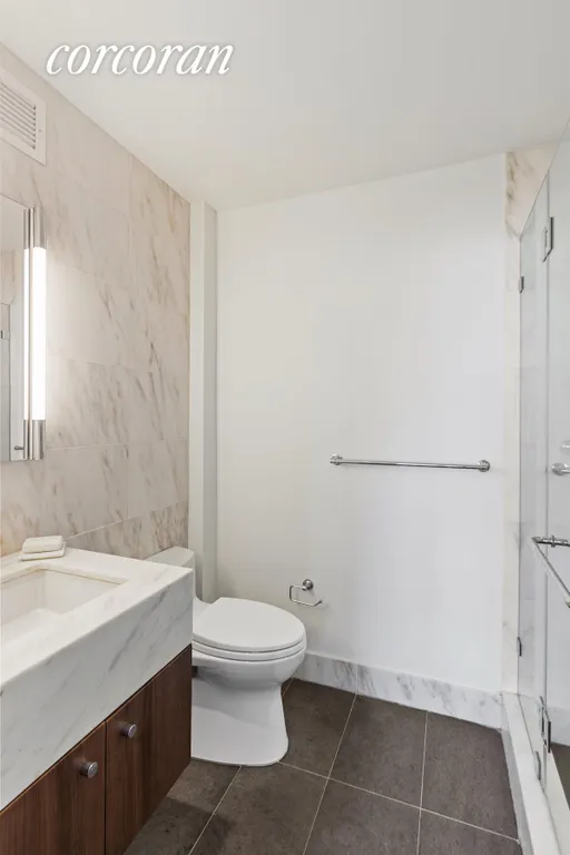 New York City Real Estate | View 200 East 62Nd Street, 10C | Master Bathroom | View 7