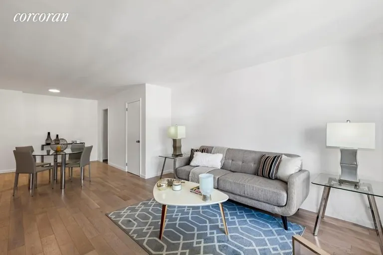 New York City Real Estate | View 400 East 77th Street, 6B | Living Room and Dining Area | View 3