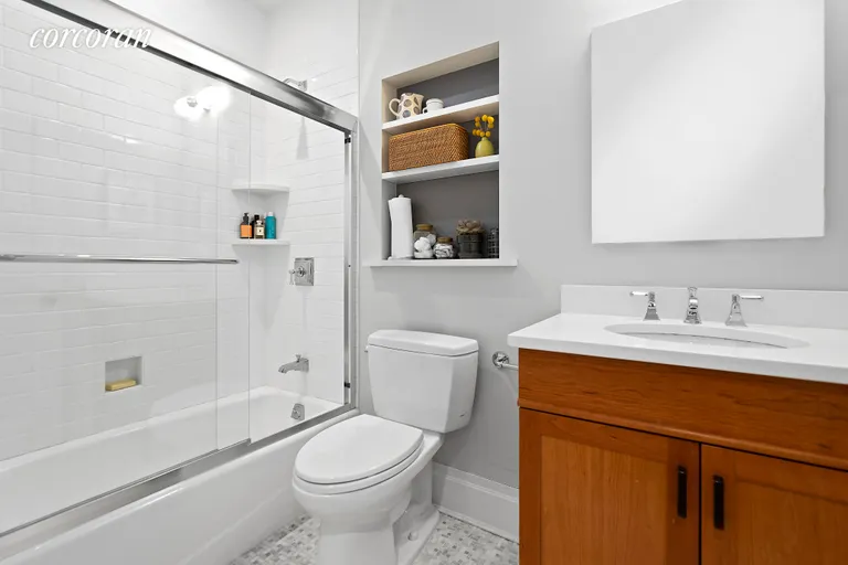 New York City Real Estate | View 443 7th Avenue | Renovated bath with crisp, clean detail. | View 7