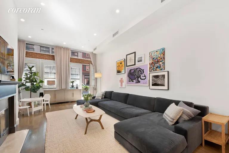 New York City Real Estate | View 25 Leonard Street, 1 | Living Room | View 2