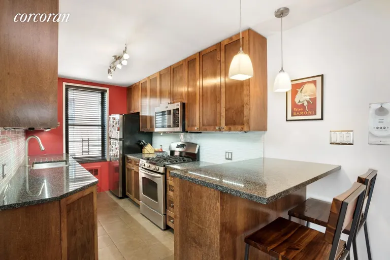 New York City Real Estate | View 515 East 7th Street, 4N | Open Windowed Kitchen w/Breakfast C | View 3