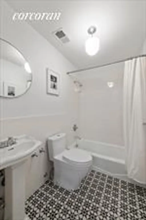 New York City Real Estate | View 203 East 13th Street, 1B | Gorgeous Tiled Bath! | View 8