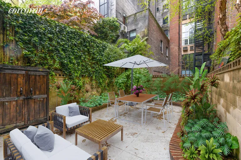 New York City Real Estate | View 24 West 68th Street | South-facing garden - virtually staged | View 9
