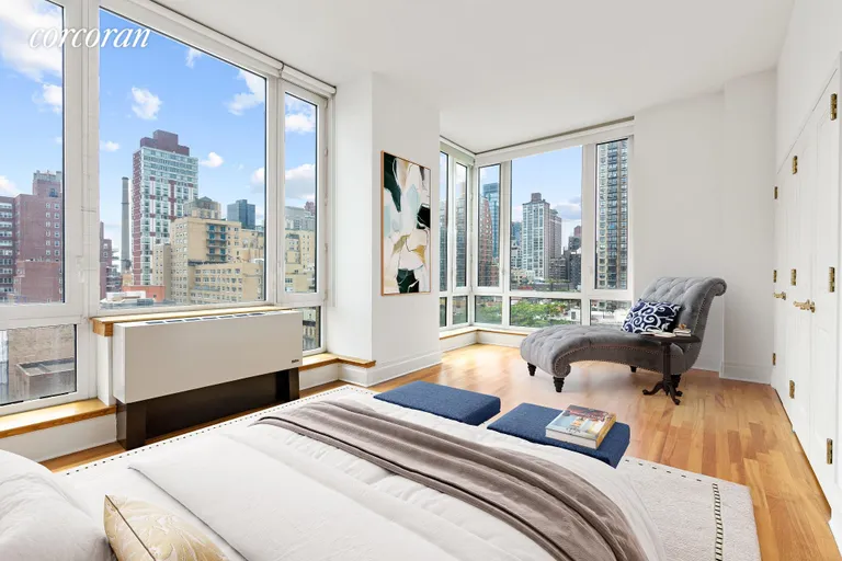 New York City Real Estate | View 300 East 77th Street, 10A | Corner primary bedroom suite | View 4