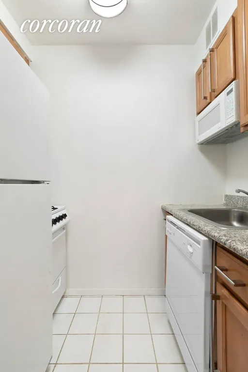 New York City Real Estate | View 393 West 49th Street, 4EE | Kitchen | View 4