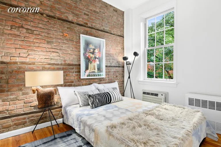 New York City Real Estate | View 326 West 22ND Street, 2F | Bedroom with High Ceilings and Expo | View 3