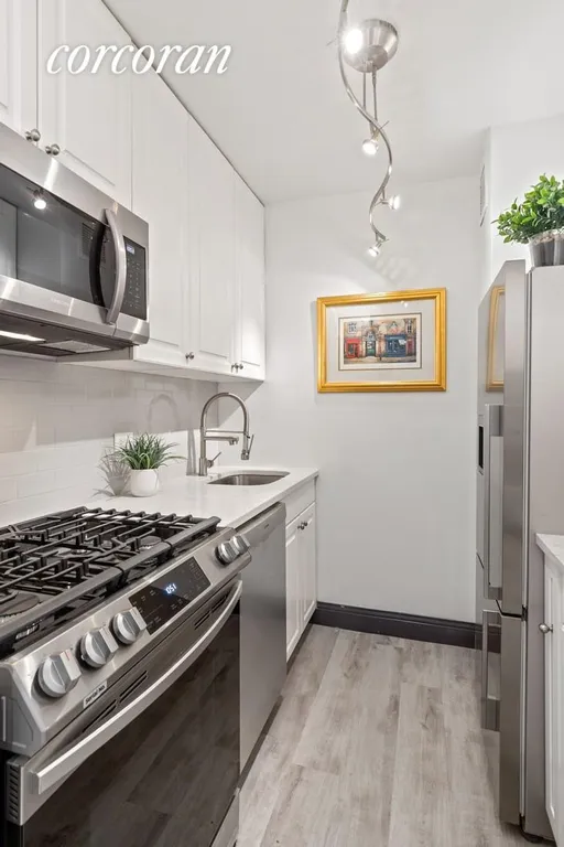 New York City Real Estate | View 61 West 62Nd Street, 11F | Kitchen | View 5