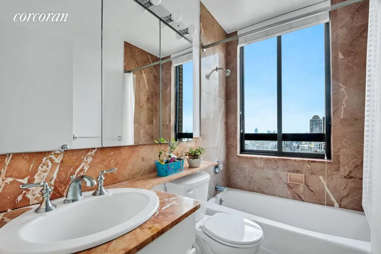New York City Real Estate | View 171 East 84th Street, 27D | Marble Bath | View 8