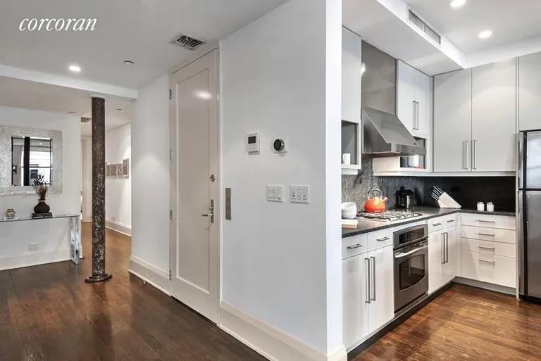New York City Real Estate | View 102 Fulton Street, 7E | Kitchen/Hallway | View 6
