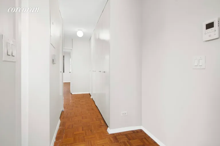 New York City Real Estate | View 379 West Street, 1B | Hallway with Abundant Closets | View 5