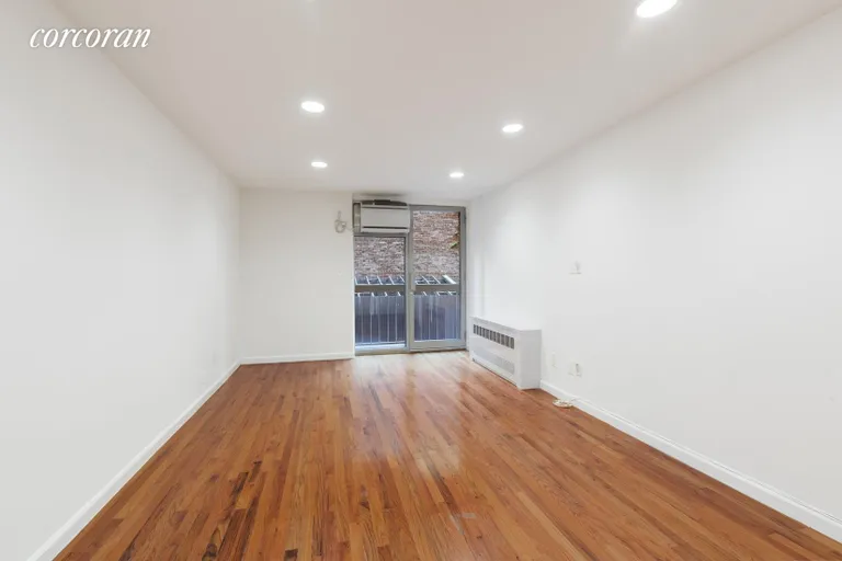 New York City Real Estate | View 184 Thompson Street, MA | living room with private balcony | View 3