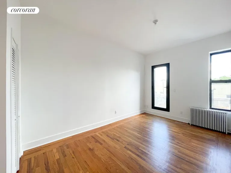 New York City Real Estate | View 760 Saint Nicholas Avenue, 4 | Bedroom w/door to deck | View 5