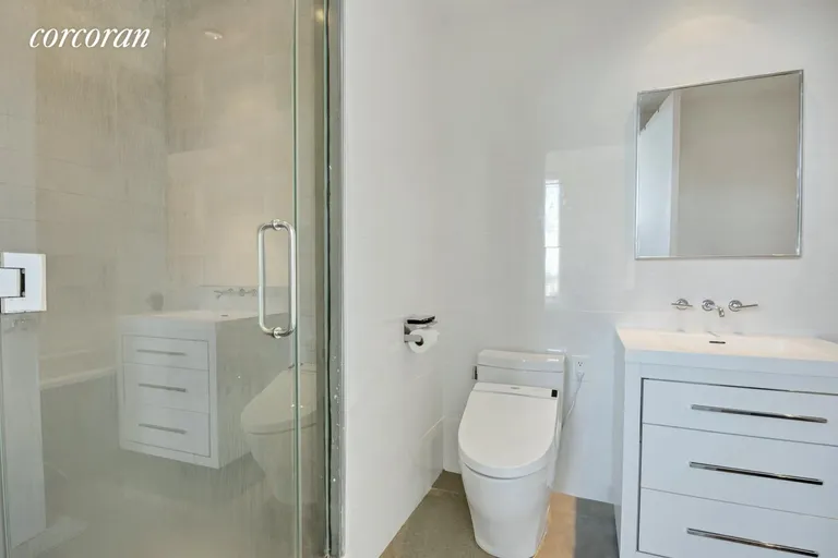 New York City Real Estate | View 30 Bayard Street, 8C | Primary Bathroom w. Tub & Shower | View 5
