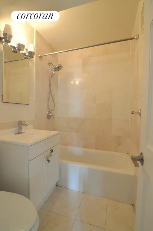 New York City Real Estate | View 201 East 36th Street, 15F | Marble Tile Bath | View 7