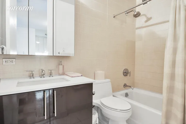 New York City Real Estate | View 300 East 40th Street, 15X | Marble bath | View 5
