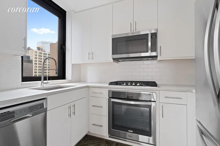 New York City Real Estate | View 100 United Nations Plaza, 14B | Renovated windowed kitchen | View 3