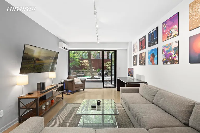 New York City Real Estate | View 314 West 56th Street, LD | Living Room | View 2