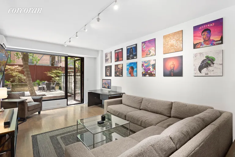 New York City Real Estate | View 314 West 56th Street, LD | Living Room | View 3