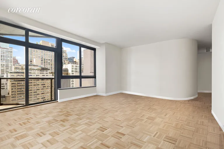 New York City Real Estate | View 100 United Nations Plaza, 19C | Living room with private balcony | View 4