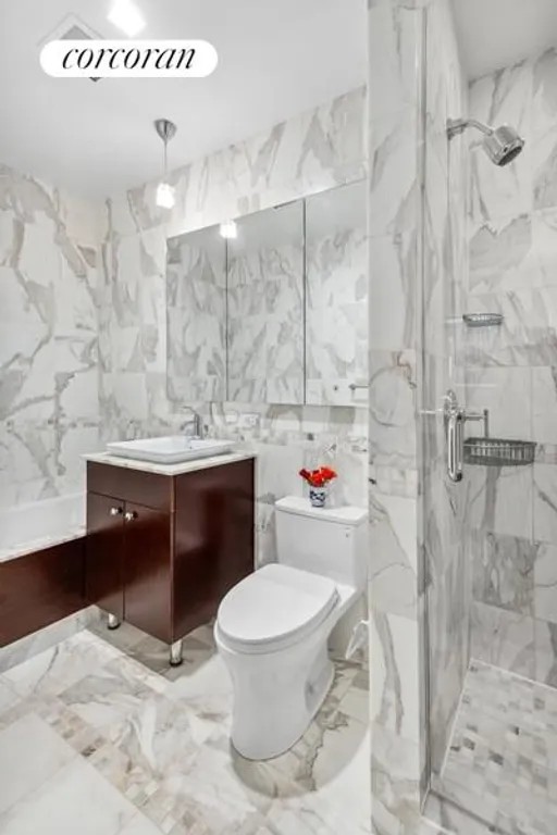 New York City Real Estate | View 212 East 57th Street, 8B | En-Suite Bath w Stall Shower & Tub | View 6
