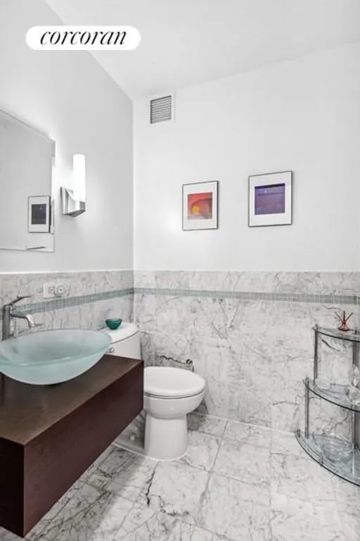 New York City Real Estate | View 212 East 57th Street, 8B | Powder Room | View 7