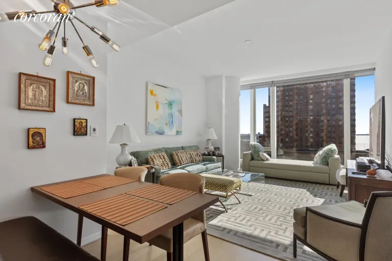 New York City Real Estate | View 50 West Street, 10B | Dining Room/Living Room | View 3