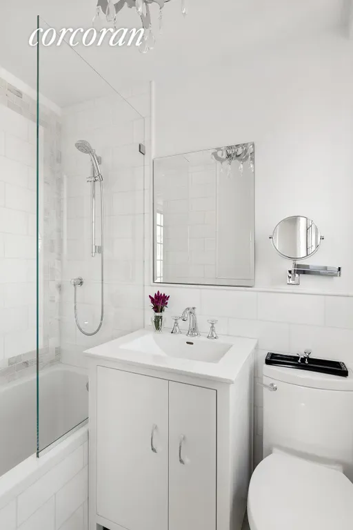 New York City Real Estate | View 320 East 42Nd Street, 2809 | Windowed Bath with Deep Soaking Tub | View 8