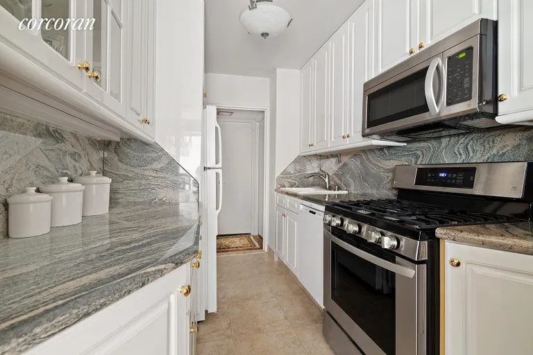 New York City Real Estate | View 200 Central Park South, 11P | Crisp kitchen with pretty granite | View 5