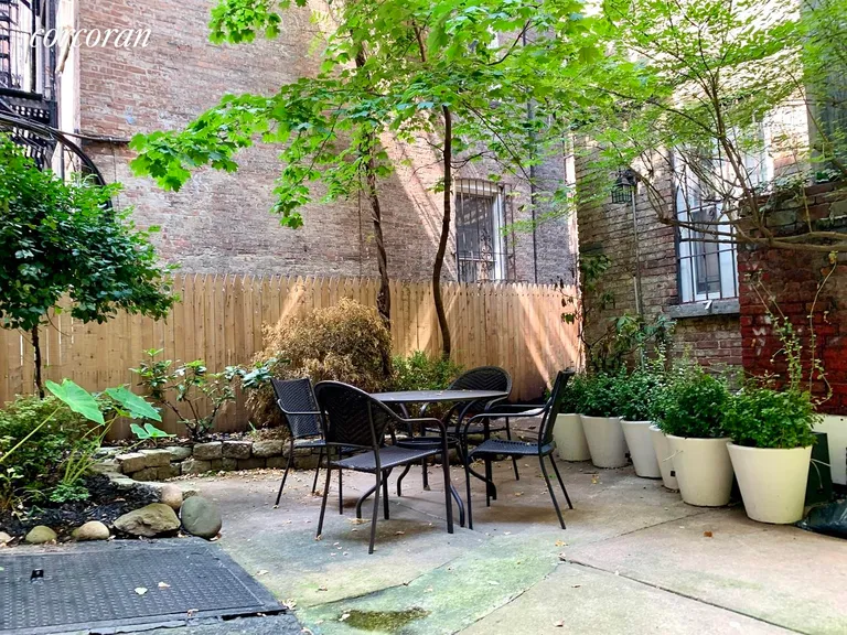 New York City Real Estate | View 328 West 17th Street, 4W | Garden back of building | View 10