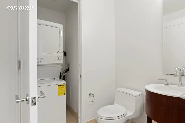 New York City Real Estate | View 30 West Street, 7D | Powder Room / WD | View 6