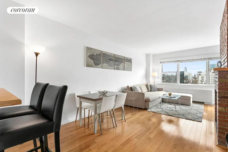 New York City Real Estate | View 77 East 12th Street, 20D | Dining and Living Area | View 2