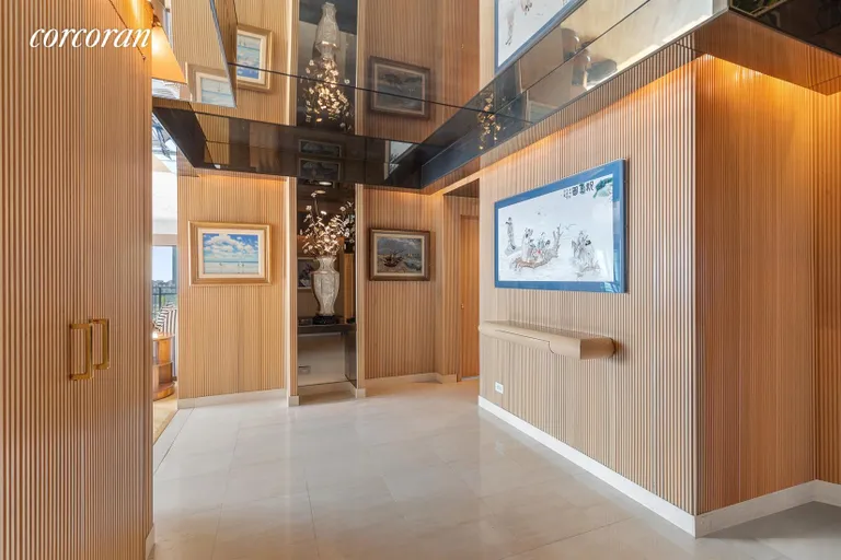 New York City Real Estate | View 303 East 57th Street, 34A | Foyer with Custom Millwork | View 5