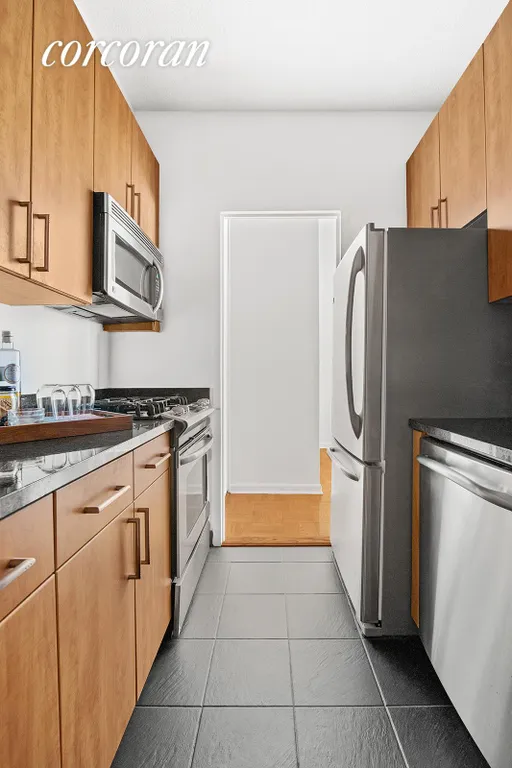 New York City Real Estate | View 60 East 8th Street, 9P | Kitchen | View 5