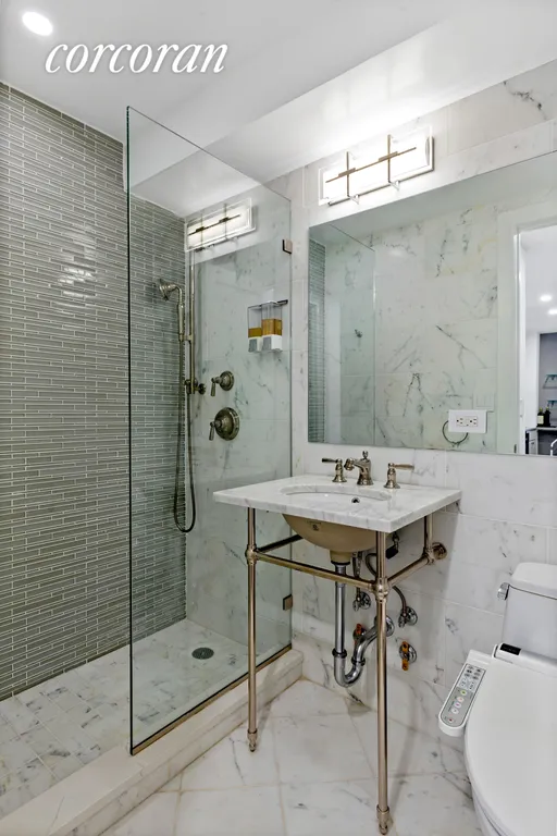 New York City Real Estate | View 63 East 9th Street, 11A | Bathroom | View 3