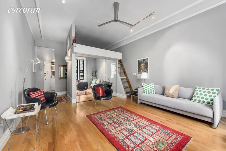 New York City Real Estate | View 140 West 69th Street, 83B | Living Room | View 3