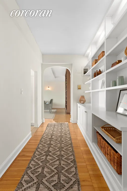 New York City Real Estate | View 118 8th Avenue, 10A | The entry hall has shelves and cabi | View 4