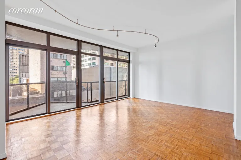 New York City Real Estate | View 100 United Nations Plaza, 8E | Dining area in living room | View 2