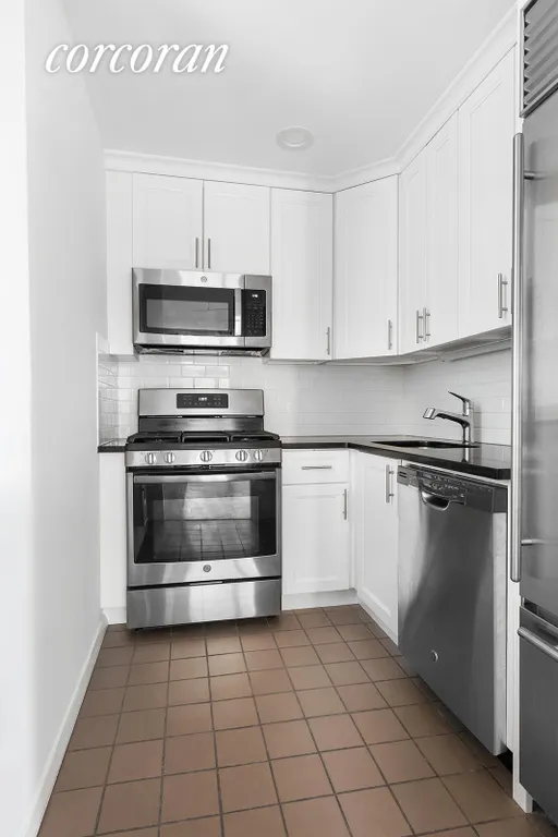 New York City Real Estate | View 100 United Nations Plaza, 8E | Renovated windowed kitchen | View 3