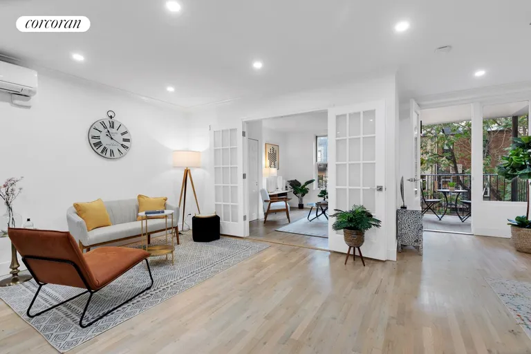 New York City Real Estate | View 252 West 74th Street, 8 | Livingroom and balcony | View 2