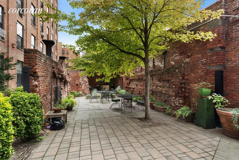 New York City Real Estate | View 29 Tiffany Place, 1G | Common Courtyard | View 11