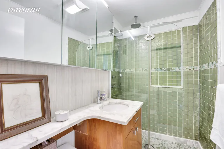 New York City Real Estate | View 77 East 12th Street, 6C | full bathroom with glass door showe | View 5