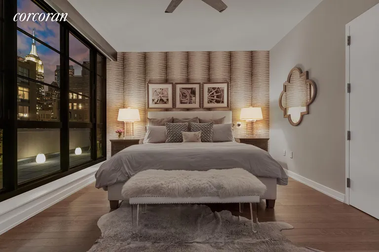 New York City Real Estate | View 261 West 25th Street, 9C | Main Bedroom at Night | View 9