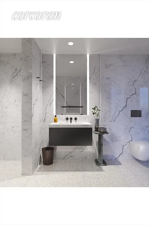New York City Real Estate | View 16 West 40th Street, 22C | Half Bathroom | View 5