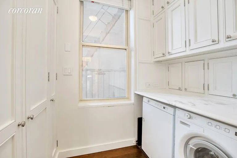 New York City Real Estate | View 912 Fifth Avenue, 6A | Laundry Room in Apt | View 22