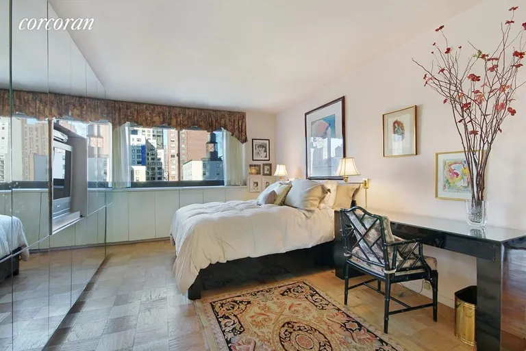 New York City Real Estate | View 1725 York Avenue, 14H | Sunny Bedroom with En-Suite Bath | View 3