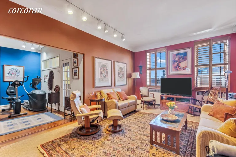 New York City Real Estate | View 200 Pinehurst Avenue, 6HJ | Living Room and Den | View 2